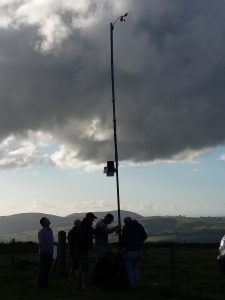 How many people does it take to grease a pole?